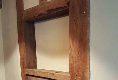 An indoor wall after plastering and rendering.